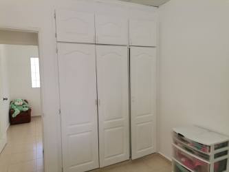 Compact bathroom with shower, ceramic tiles in Vista Alegre affordable house Panama Oeste