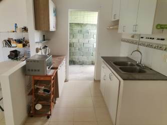 Minimalist bedroom with window and tiled floor in residential house Vista Alegre Arraiján Panama