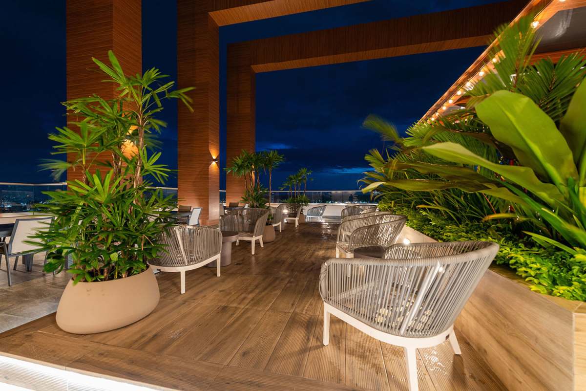 Sky garden rooftop lounge elegant design night city view Greenwood Towers Panama