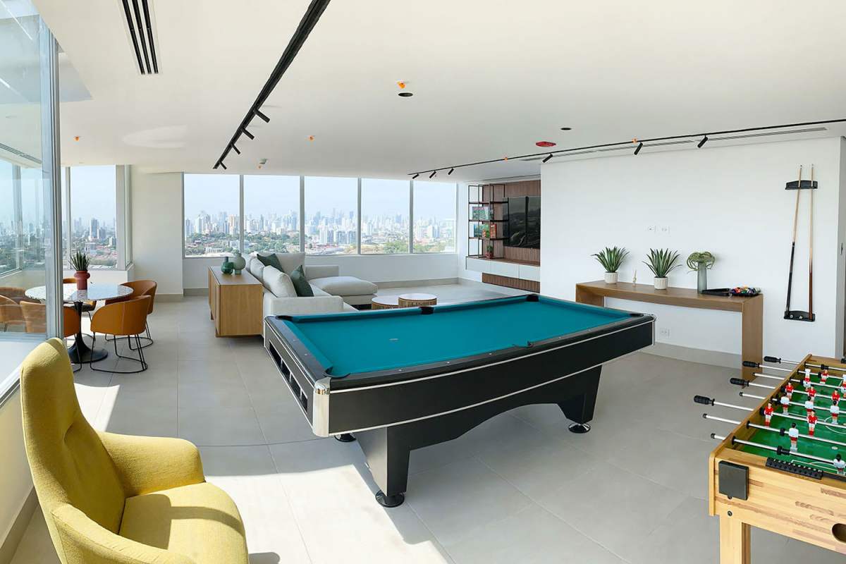 Recreation room with billiards, foosball, city skyline backdrop Greenwood Towers Panama