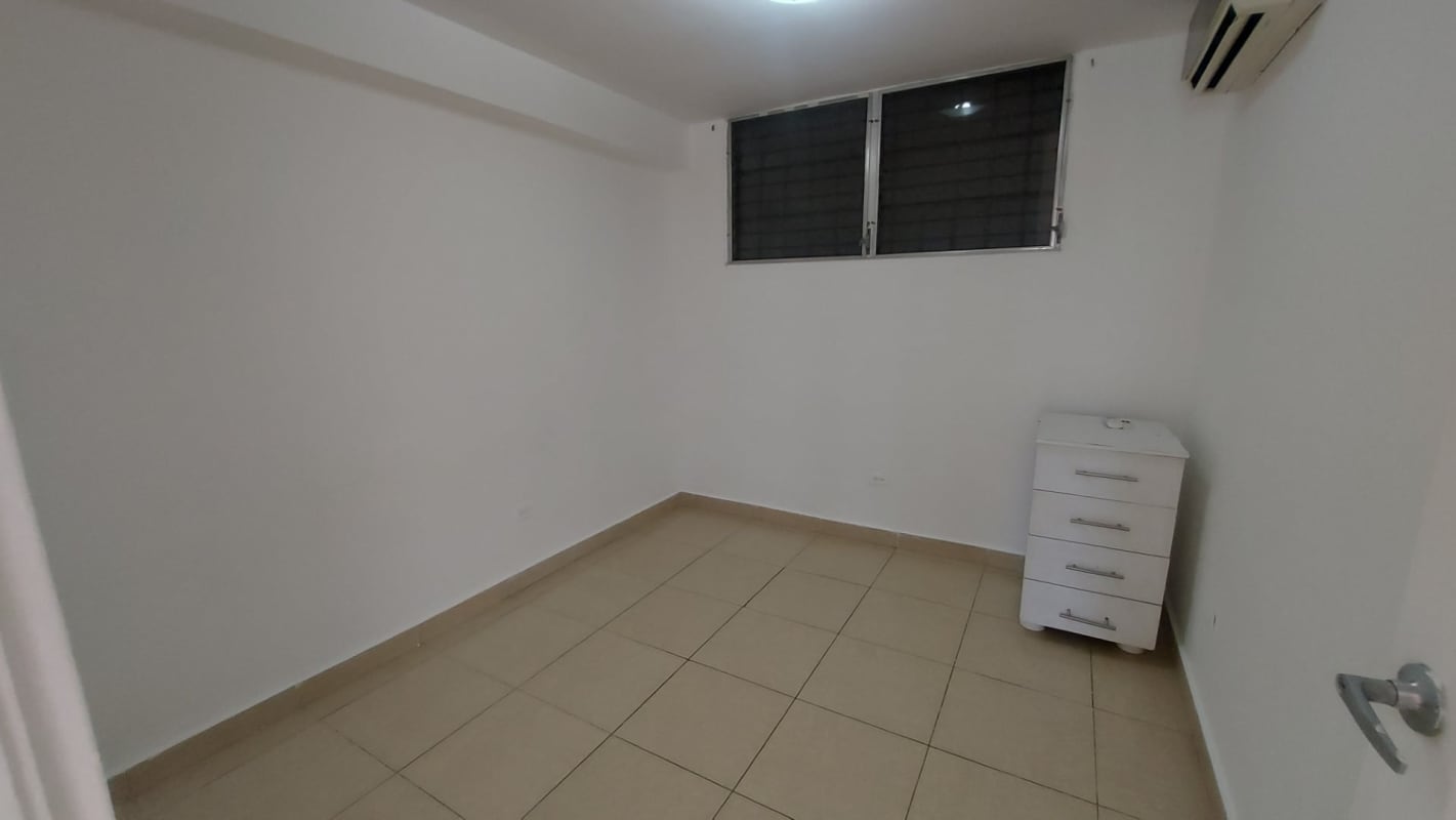 Empty bedroom with large window, tile floor in PH Bella Vista Gardens Panama City