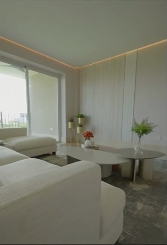Spacious living room duplex with natural light balcony golf views Santa María Panama