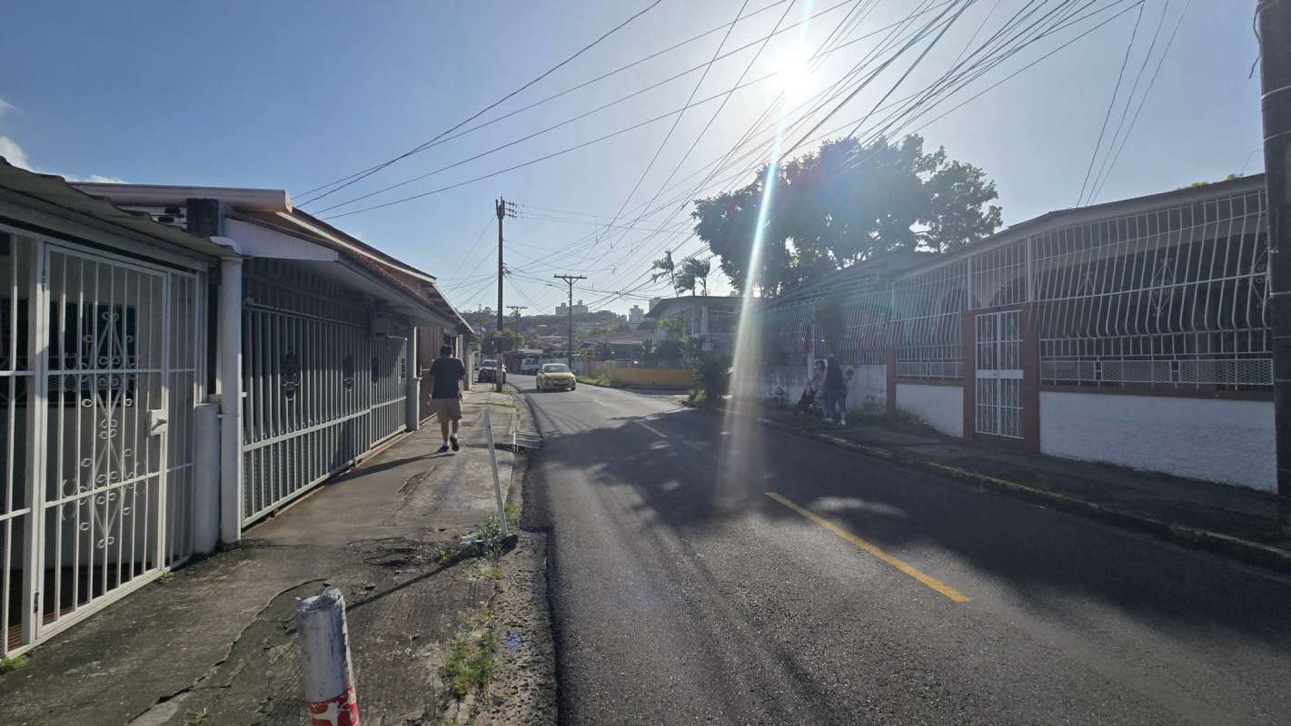 Bedroom with tiled floor and security window in house for sale Betania Panama