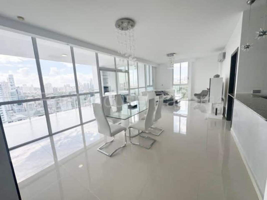 Spacious modern living room with large windows and natural lighting in PH San Francisco Tower Panama City