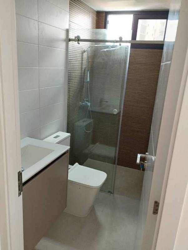 Second bathroom with glass shower and tiled walls PH Le Mans Panama