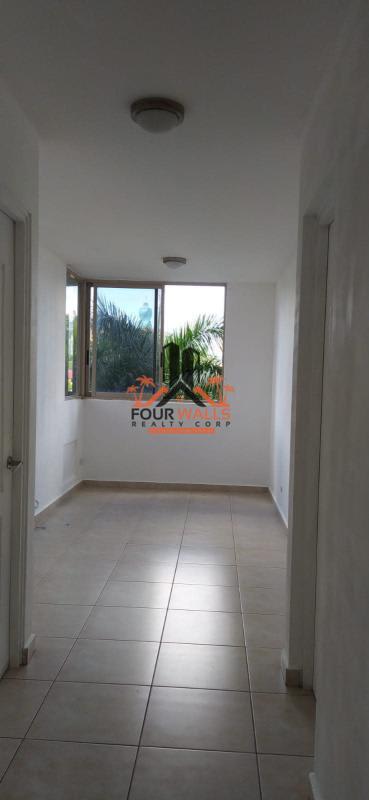 Bathroom with granite countertop, wall mirror and tiled walls PH San Francisco Bay Panama City