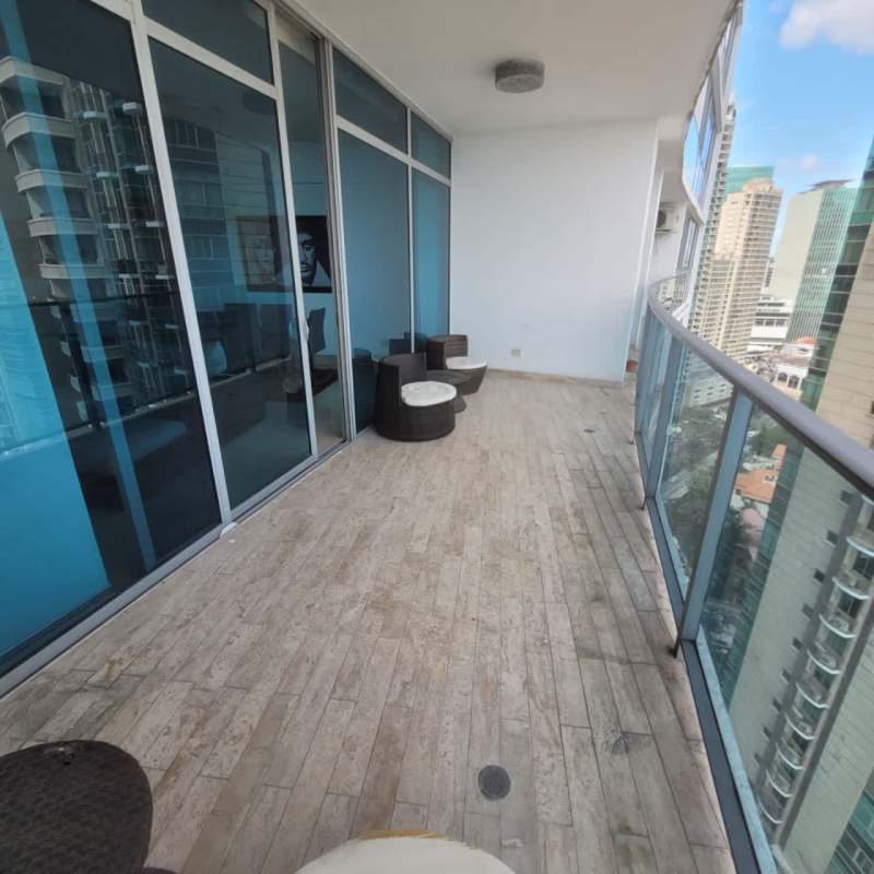 Luxury apartment living room with panoramic ocean views and marble floors in Grand Tower Punta Pacifica Panama