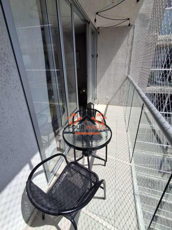 Living and dining room combo with tile floors and balcony access in PH Portoalegre Villa Lucre Panama City