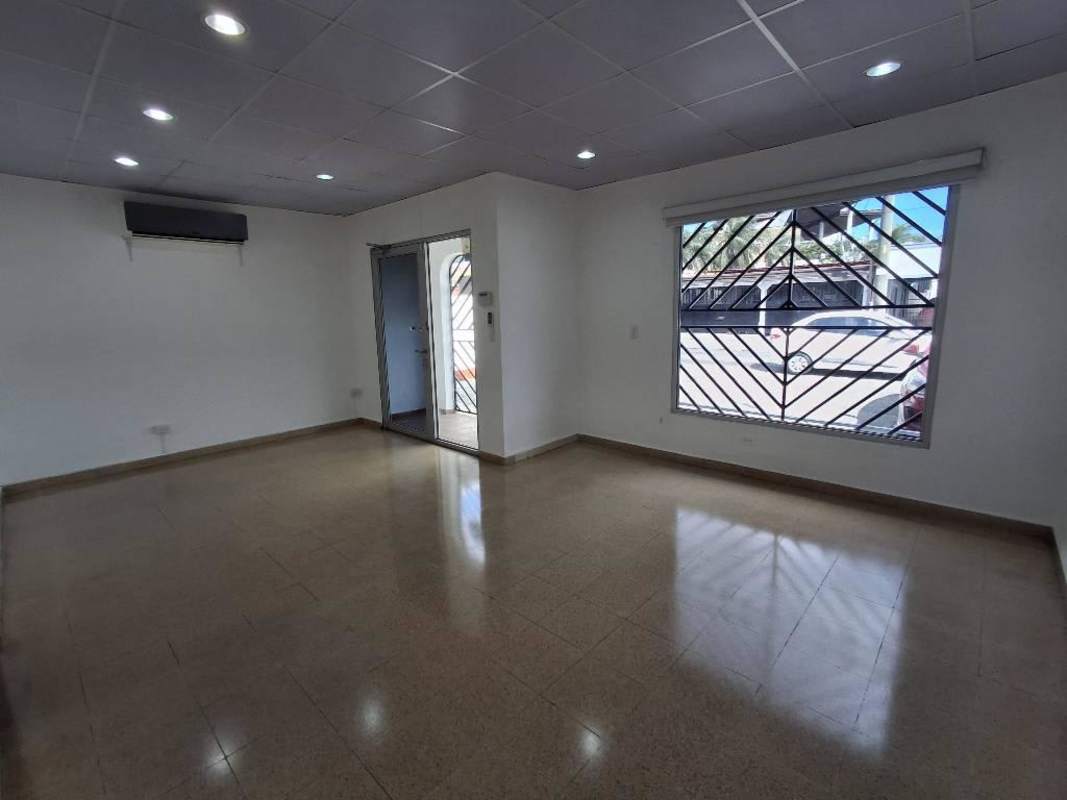 Interior commercial space with drop ceiling and tile flooring Panama City