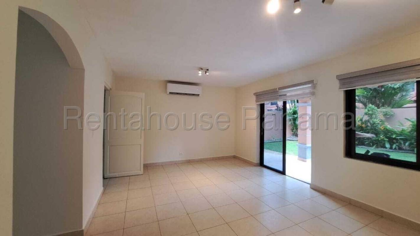 Spacious living room with ceramic tiles and garden view in Versalles Panama