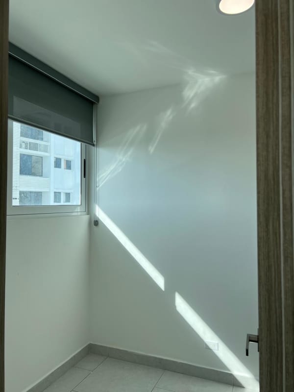 Modern kitchen with granite countertops and tile backsplash PH The Towers Panama City