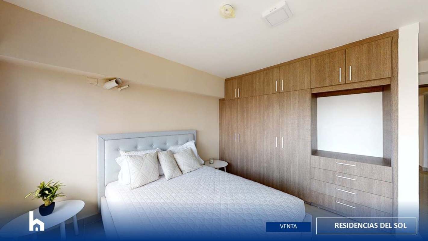 Kitchen with granite countertops, ample cabinets and large window view in Residencias del Sol Carrasquilla Panama