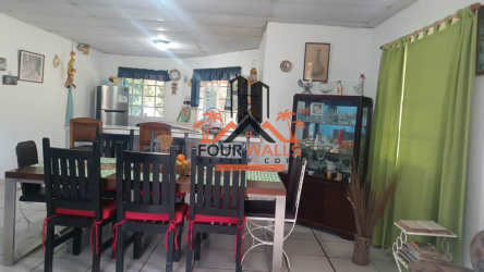 Spacious bedroom with tiled floor and natural light in beach house San Carlos Panama