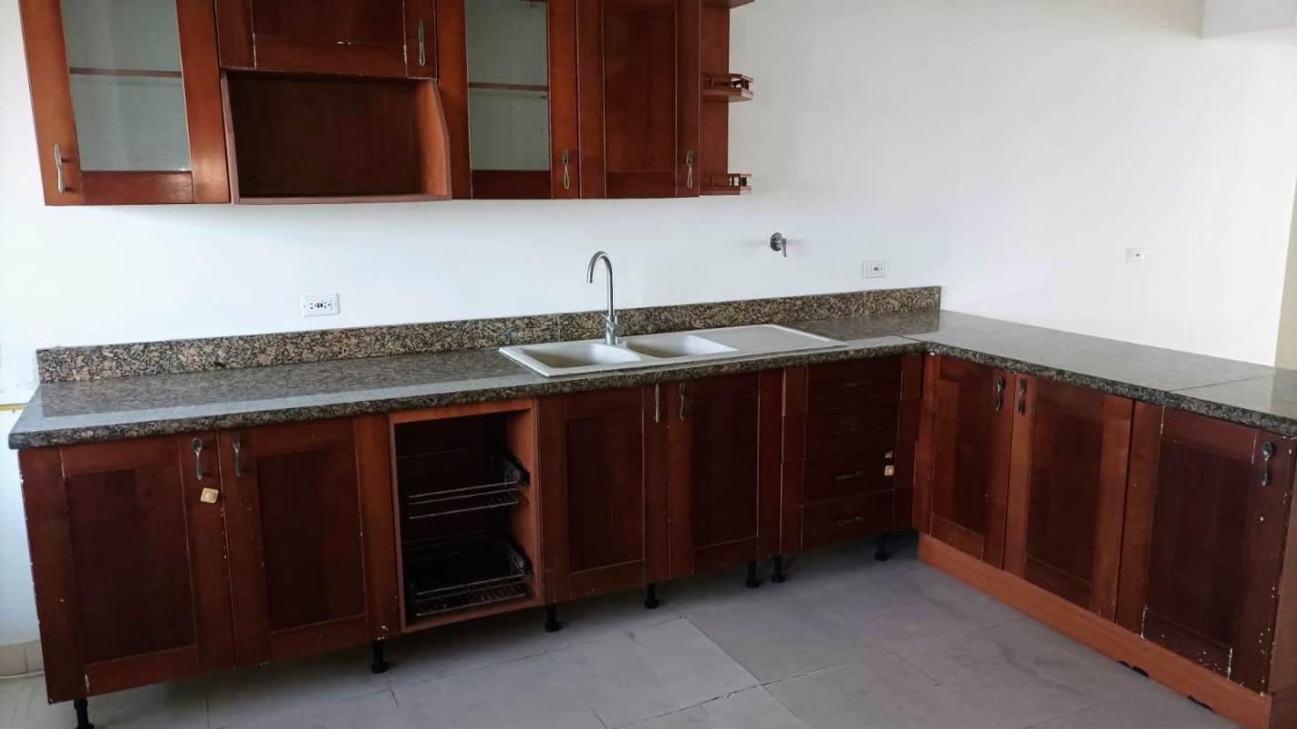Modern bathroom with glass shower, wood vanity PH Waters on the Bay Panama City