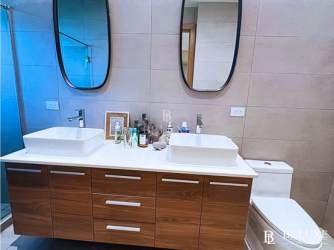 Modern bathroom with double vanity, shower at Playa Escondida beach villa Colon Panama