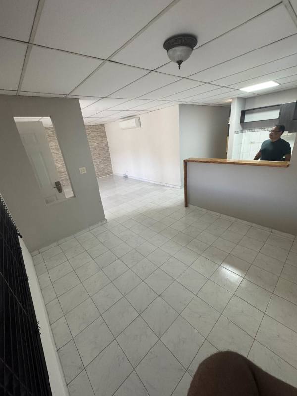 Spacious bedroom with split AC tile floors and closet in Altos de las Praderas house Panama City