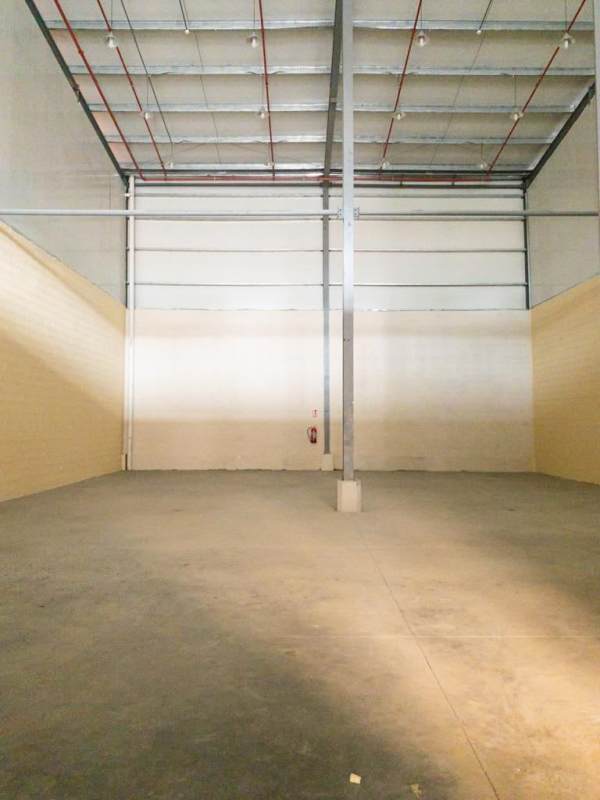 Large interior space with concrete floors and metal supports industrial warehouse Panama
