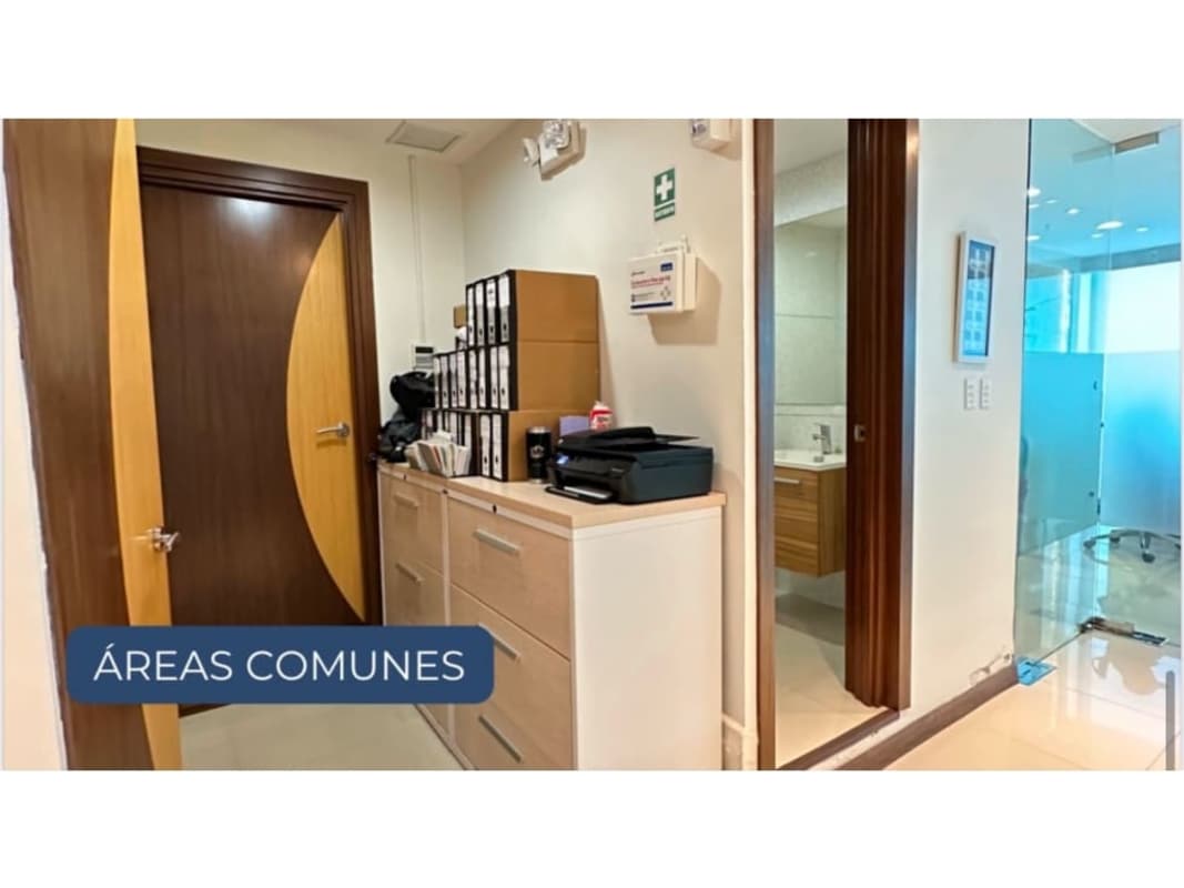 Spacious meeting room with glass partitions, white tile floor at Oceania Business Plaza Tower 1000