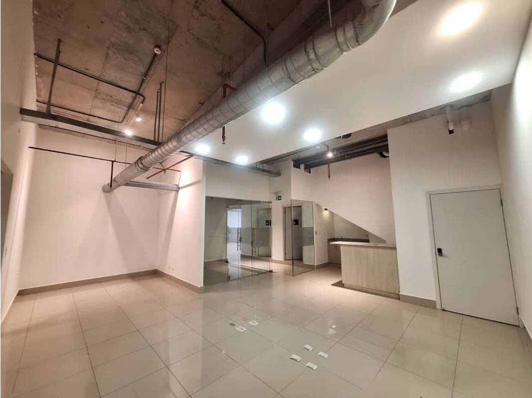 Commercial property bathroom with blue mosaic wall accent and sanitary fixtures Habitats Plaza Panama