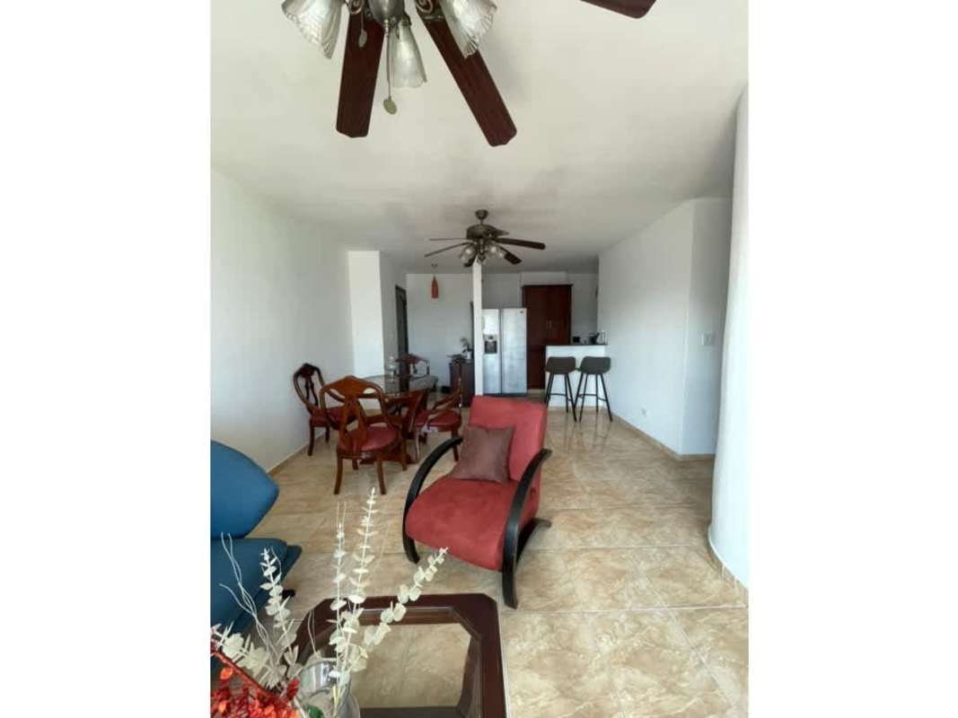 Galley kitchen granite counters cabinets stove microwave in PH Limassol Panama City