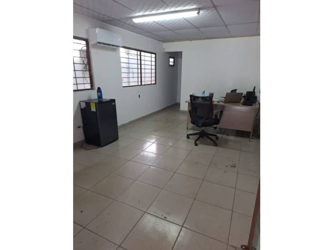 Simple mezzanine office space in warehouse Ciudad Radial Panama with desk and AC
