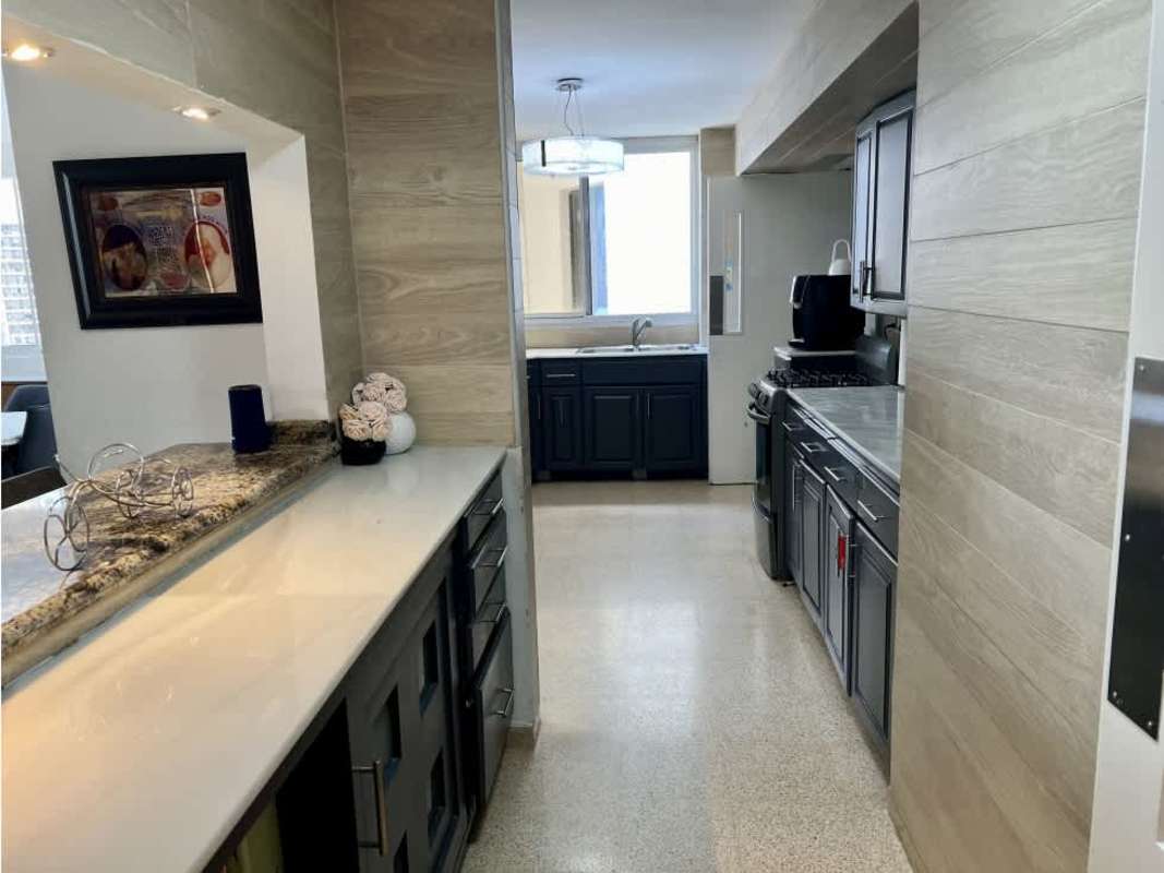 Spacious living room with large windows PH La Joya Punta Paitilla Panama City skyline view