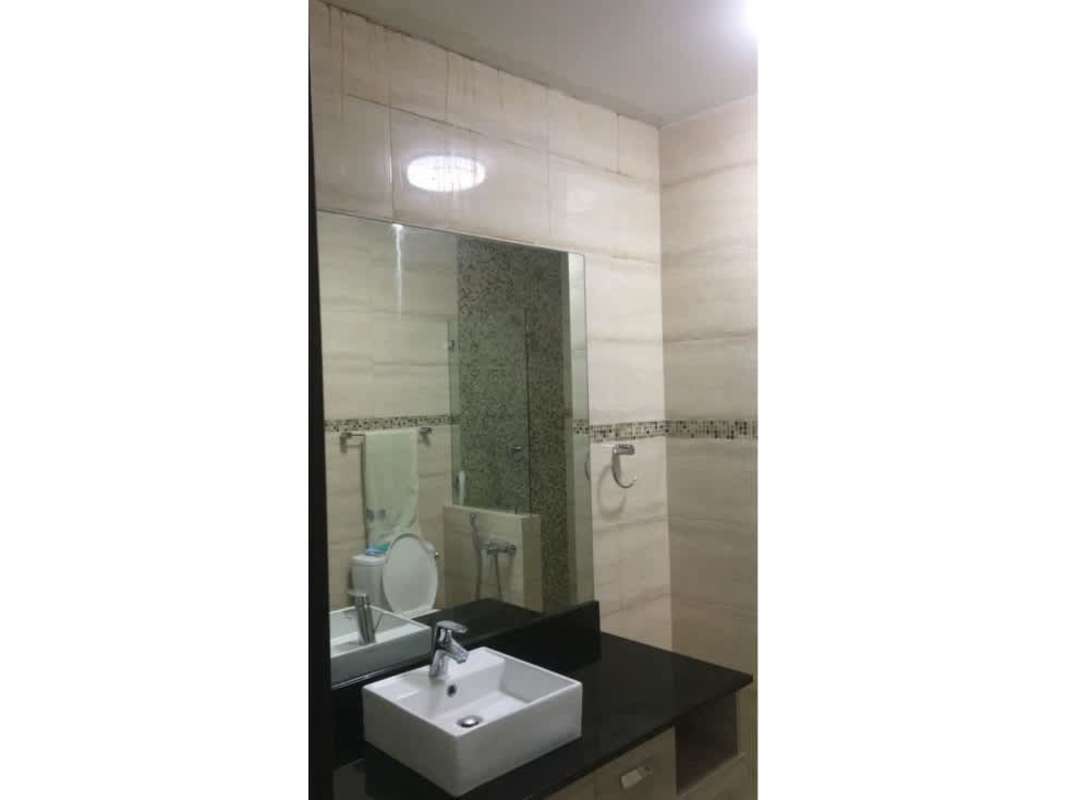 Contemporary bathroom with vessel sink large mirror Grand Tower Panama