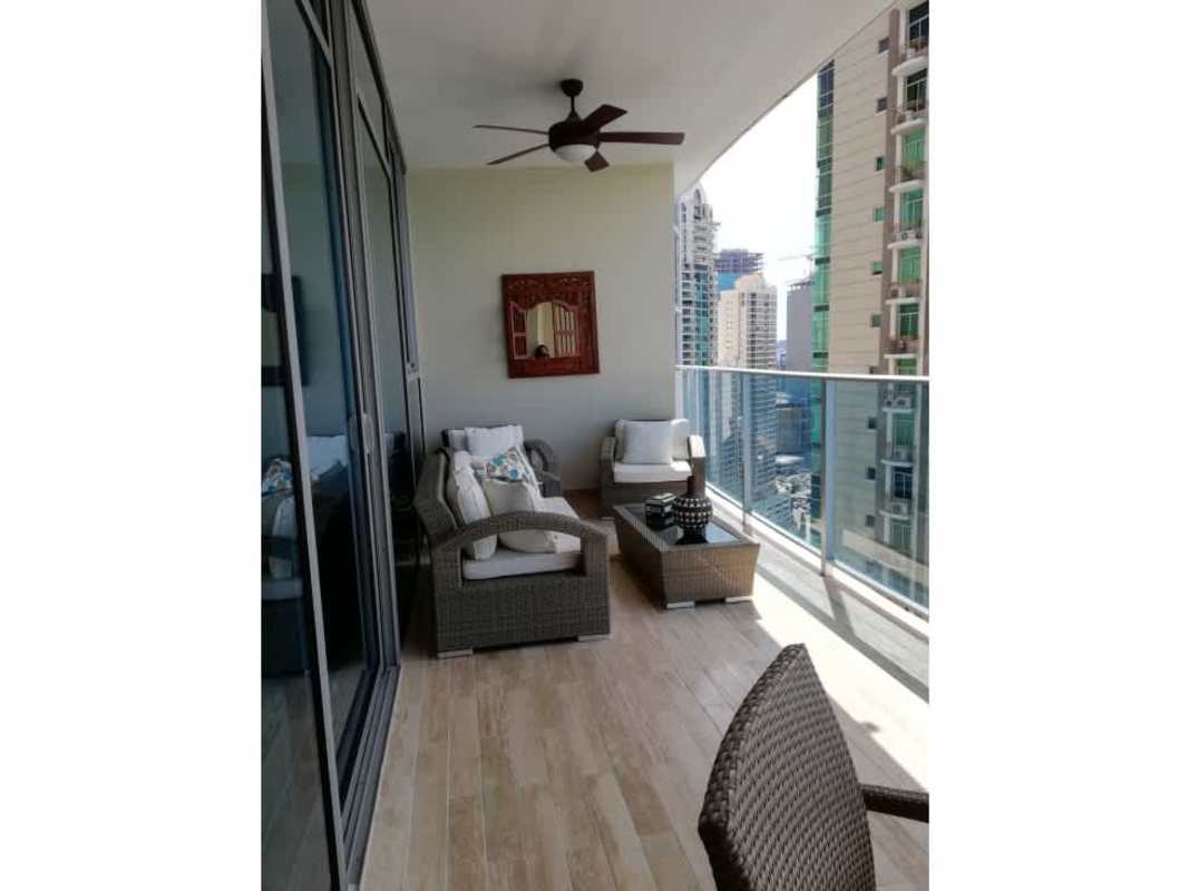 Spacious ocean view balcony with outdoor dining in Grand Tower Panama