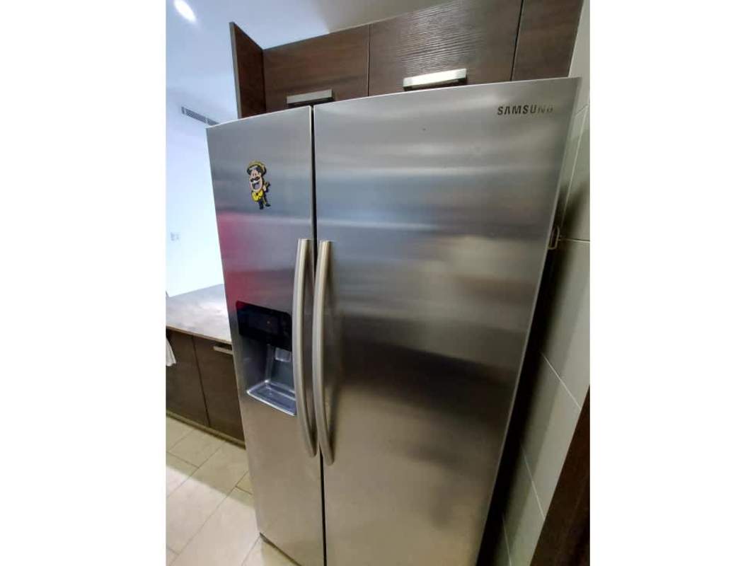 Panama City Grand Tower modern kitchen with large refrigerator and granite counters