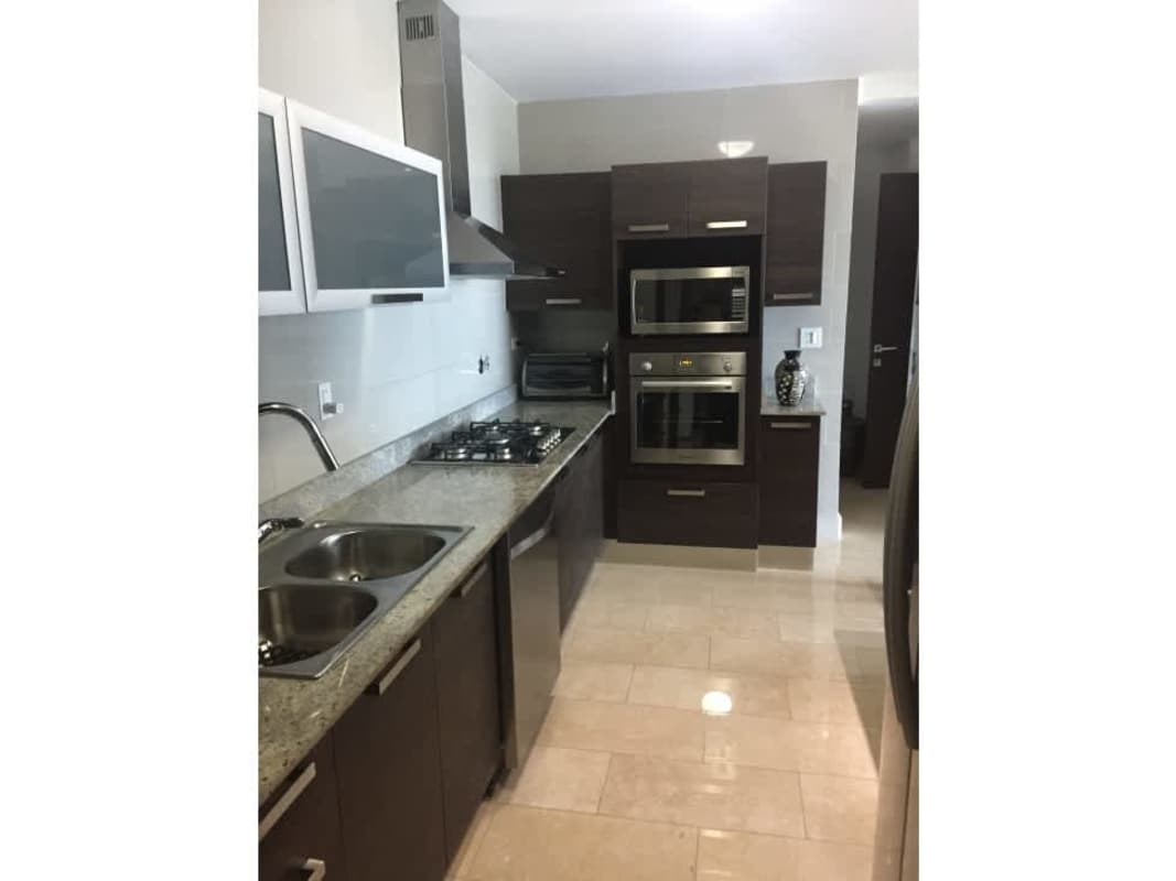 Modern kitchen granite countertop refrigerator oven PH Grand Tower Panama