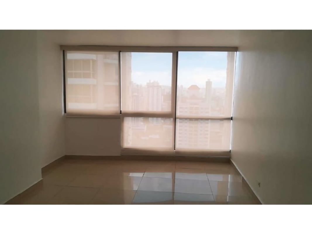 Bright bedroom with large window, ceiling fan and tiled floor in PH San Francisco Bay Tower 500 Panama