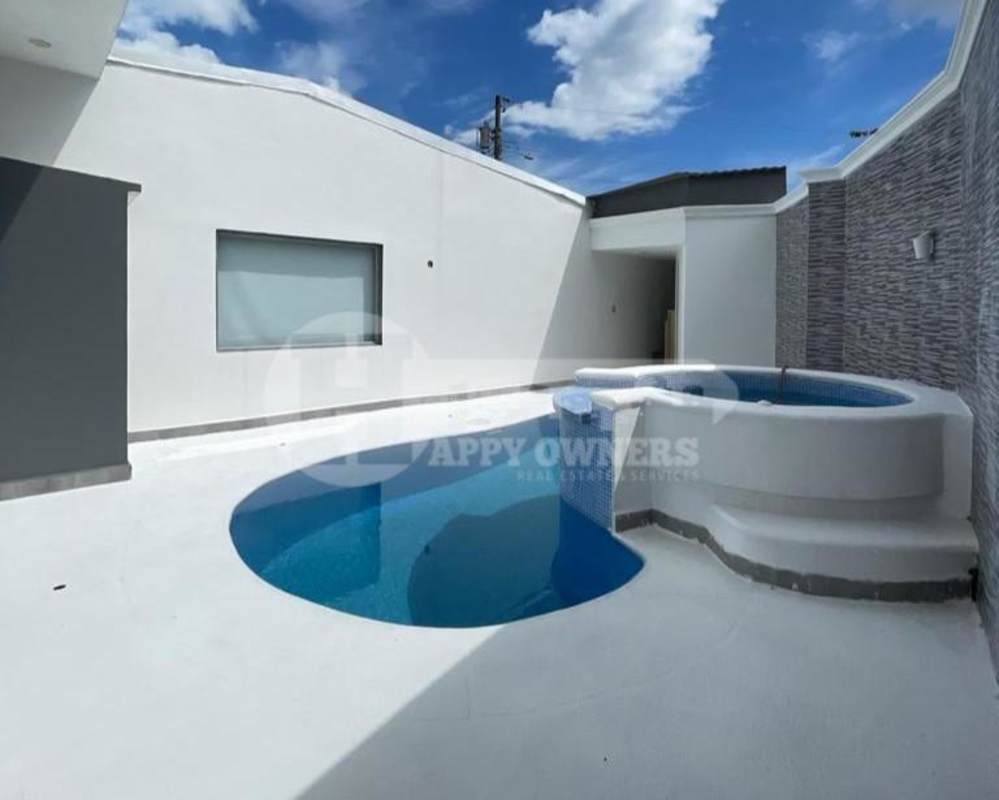 Outdoor private swimming pool with jacuzzi surrounded by modern tiles in PH Vista Magna Altos de Panamá