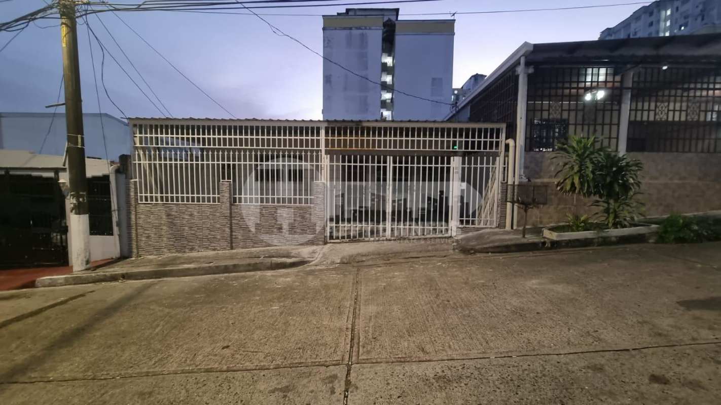 Exterior front of house with covered patio, security gates and metal bars Dorasol Panama