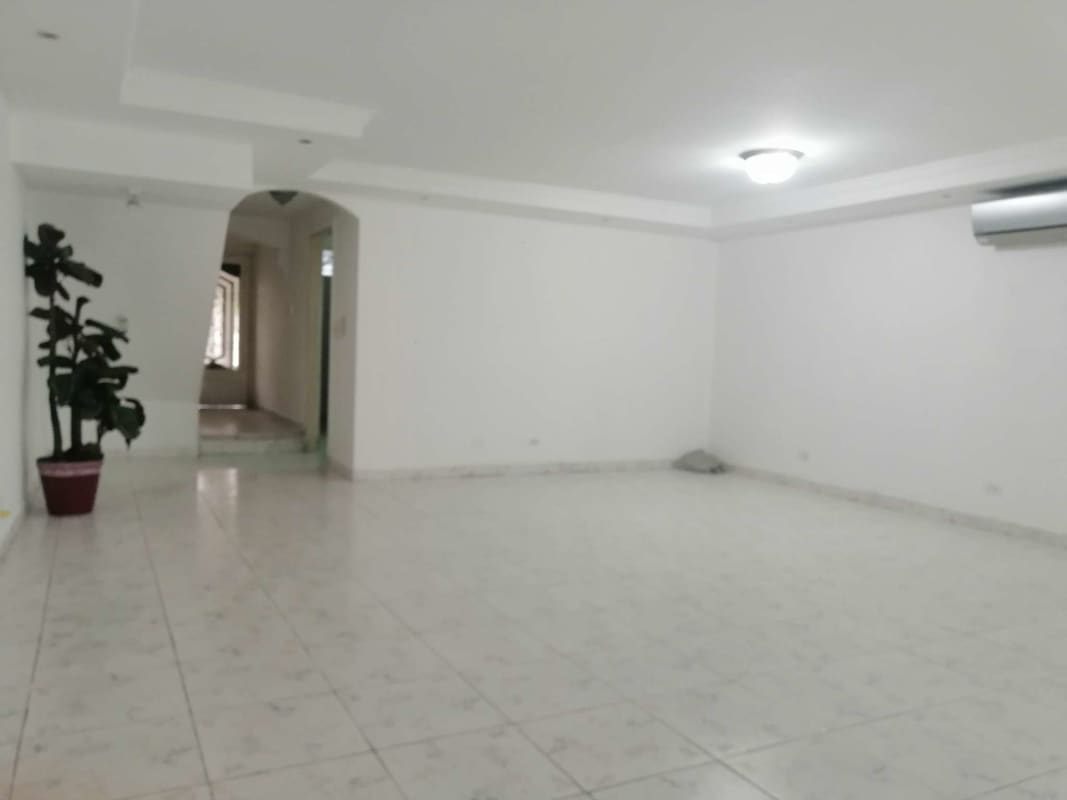 Large bright living room with tiled floors and recessed ceiling in Betania Panama