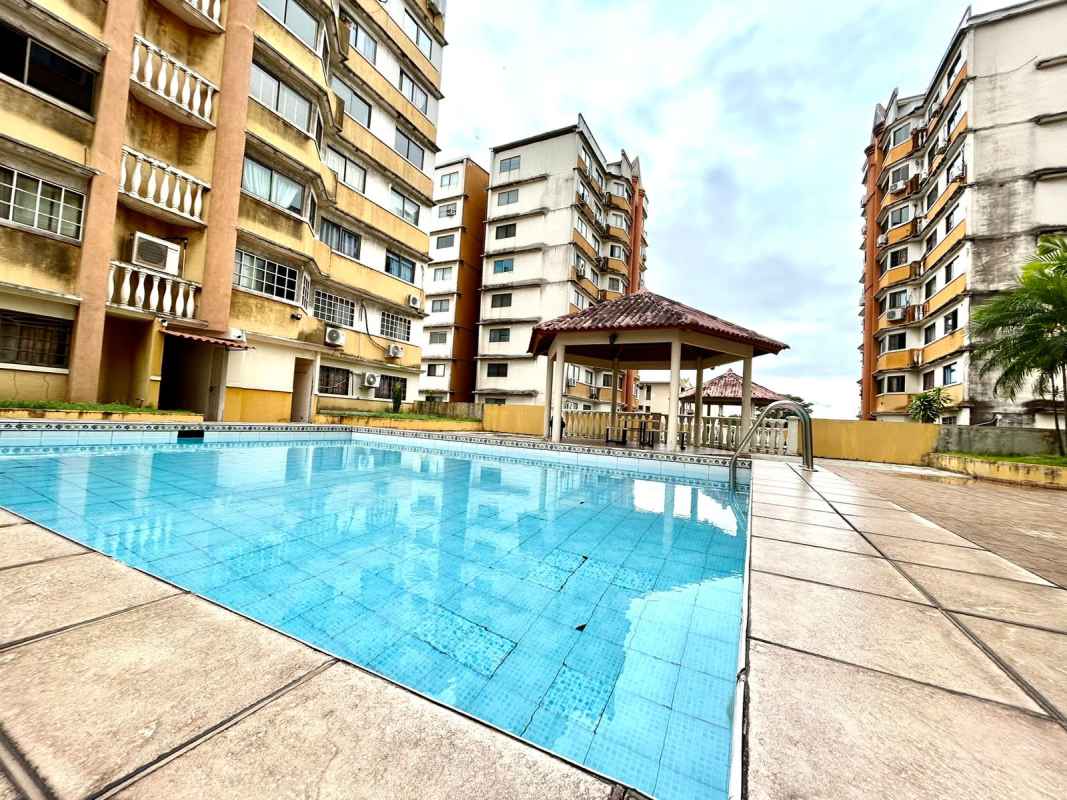 Large swimming pool with pavilion at PH Parque de Versailles Panama City