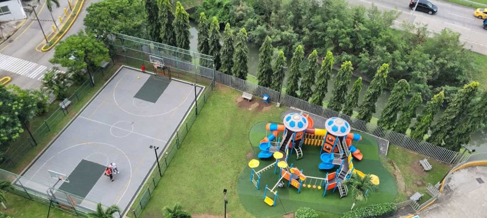 Modern kitchen with granite countertops and appliances in Quartz Tower apartment Panama