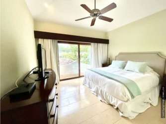 Spacious living room with vaulted ceiling tropical garden views in luxury Buenaventura villa Panama