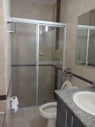 Modern kitchen with granite counters and breakfast bar PH Altamarina Playa Dorada Panama