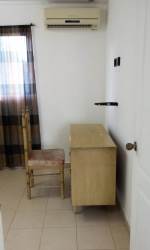 Built-in closet with drawers and hanging rods, tile flooring in Arraijan room rental