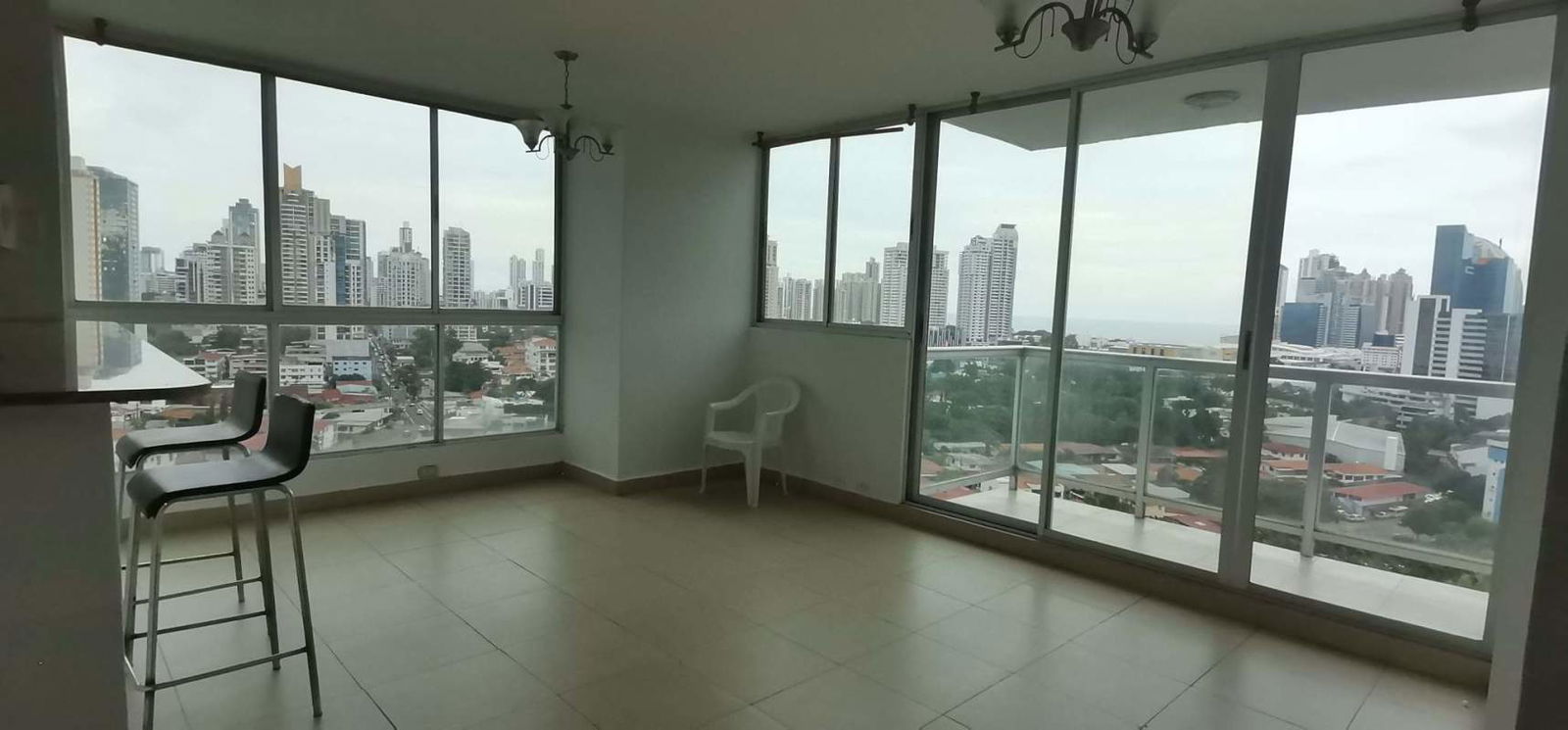 Corner apartment living with panoramic windows balcony view Oasis Tower Panama City