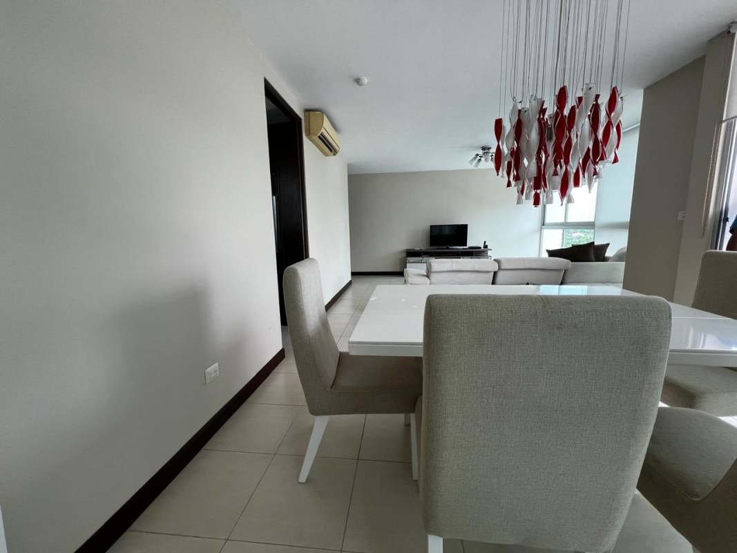Master bedroom with balcony access, ample windows in Titanium high-rise Costa del Este