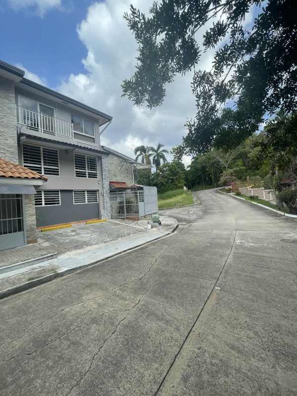 Two-story Mediterranean building with gated entry in Balboa Ancón near Canal Zone