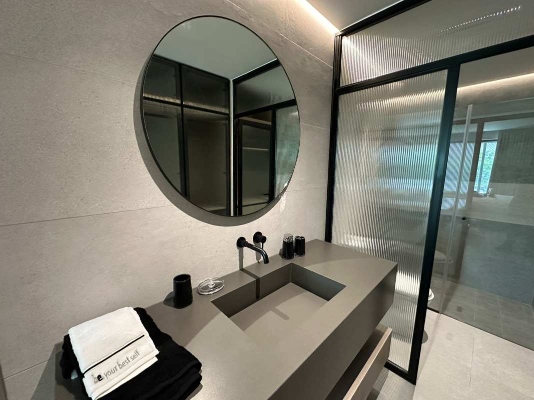 Glass enclosed balcony overlooking city skyline PH Uptown Panama City