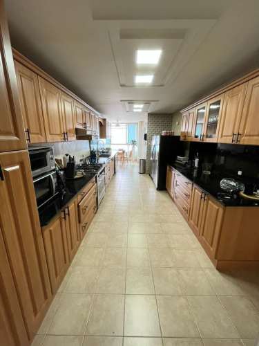 Luxury master bedroom suite with ocean and city views PH Mitelide Marbella Panama penthouse