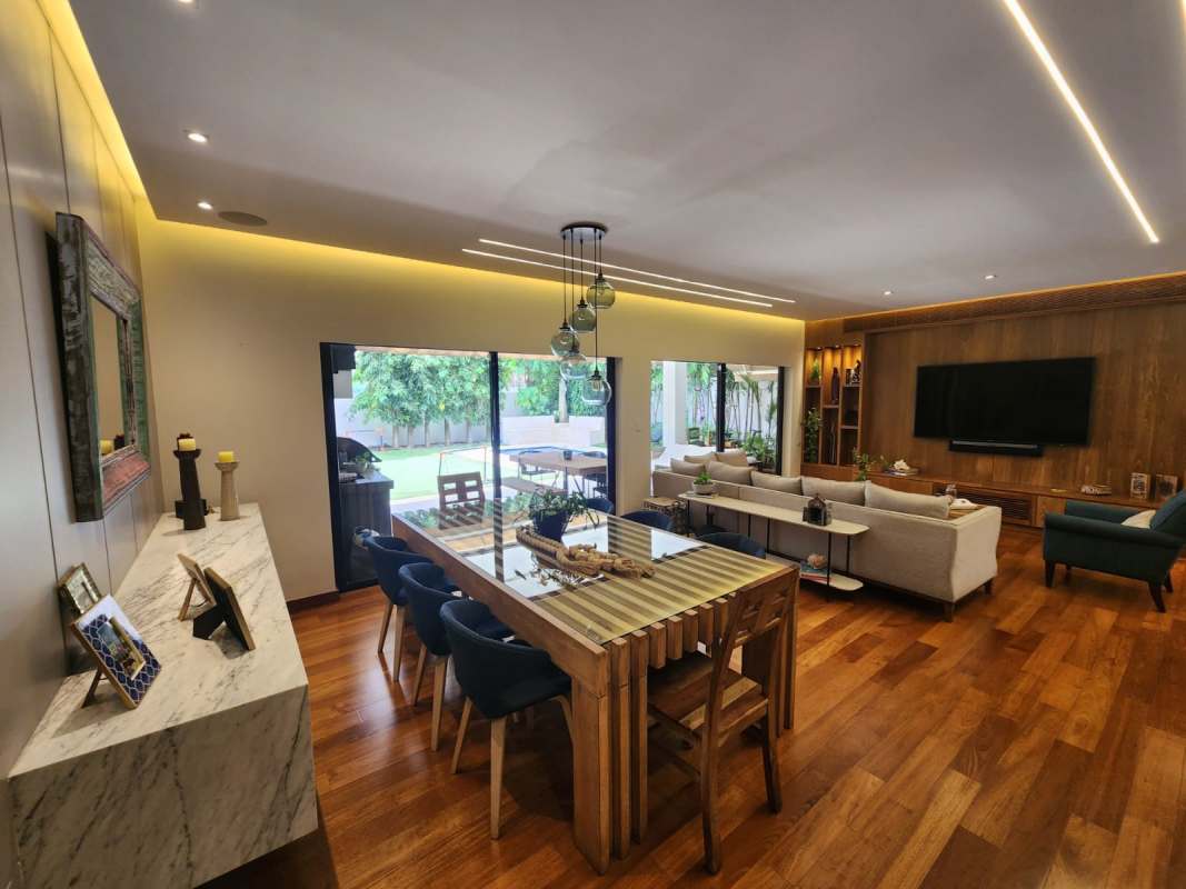 Spacious living room with large windows and wood flooring in PH Antigua Costa del Este Panama