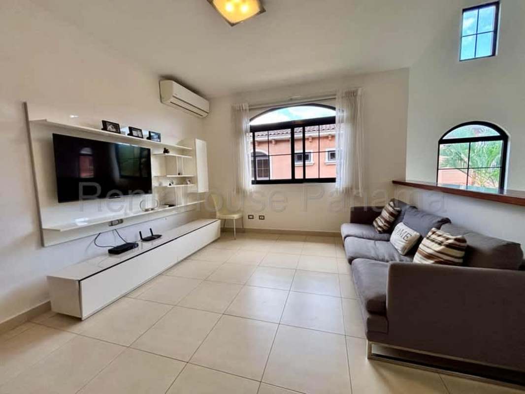 Spacious covered patio terrace opening to fenced backyard at Costa Sur Panama City