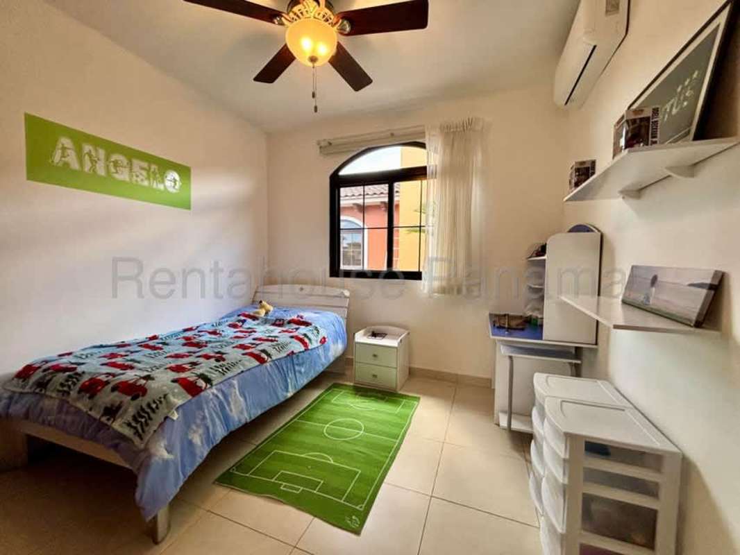 Large master bedroom suite with walk-in closet, garden view, porcelain floors in El Doral Costa Sur Panama