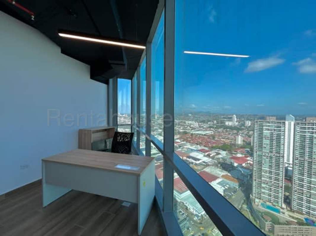 Private office unit with panoramic windows overlooking Costa del Este skyline Panama