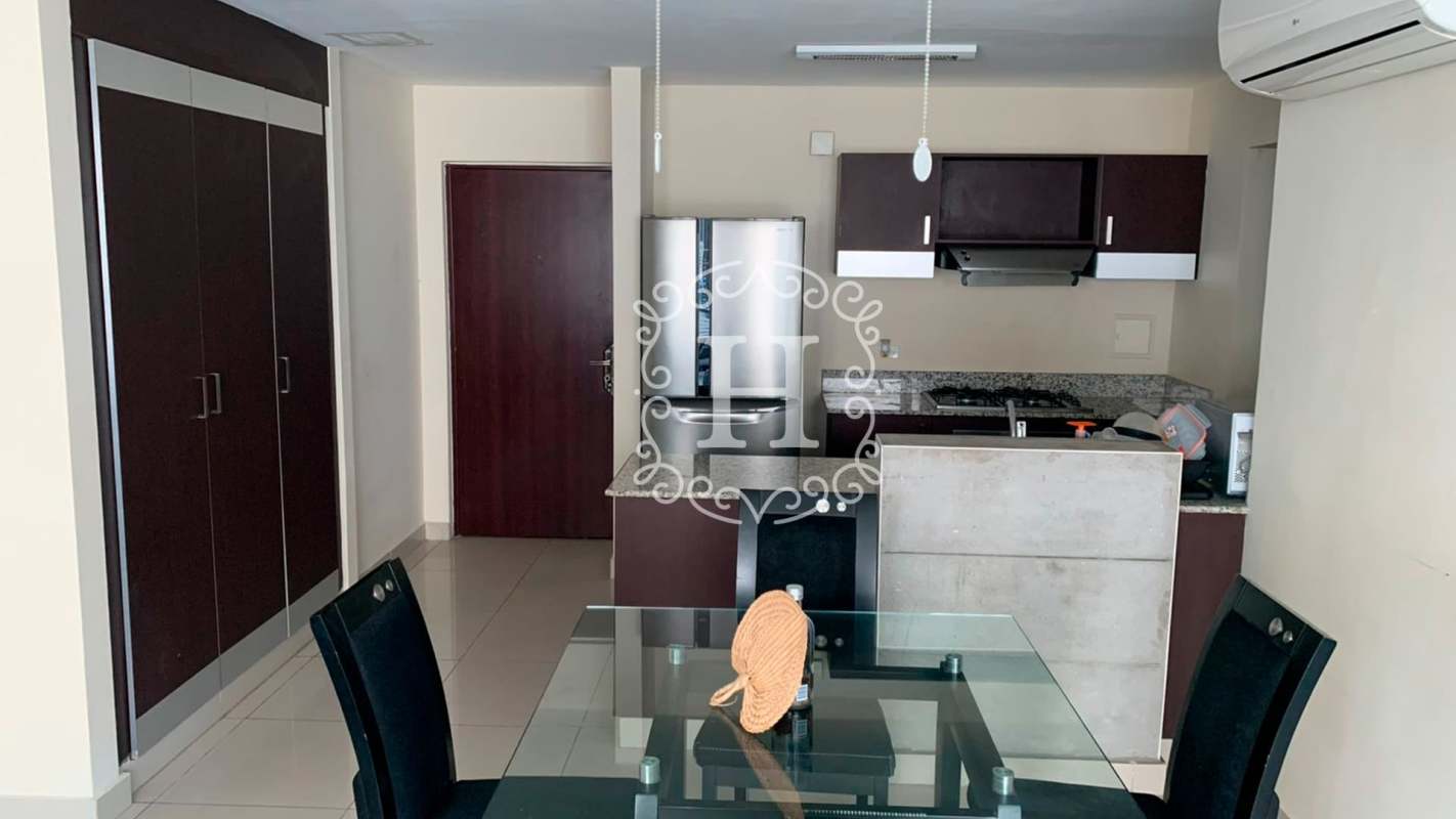 Modern loft living room with large windows, sectional sofa, and city view, El Cangrejo Panama