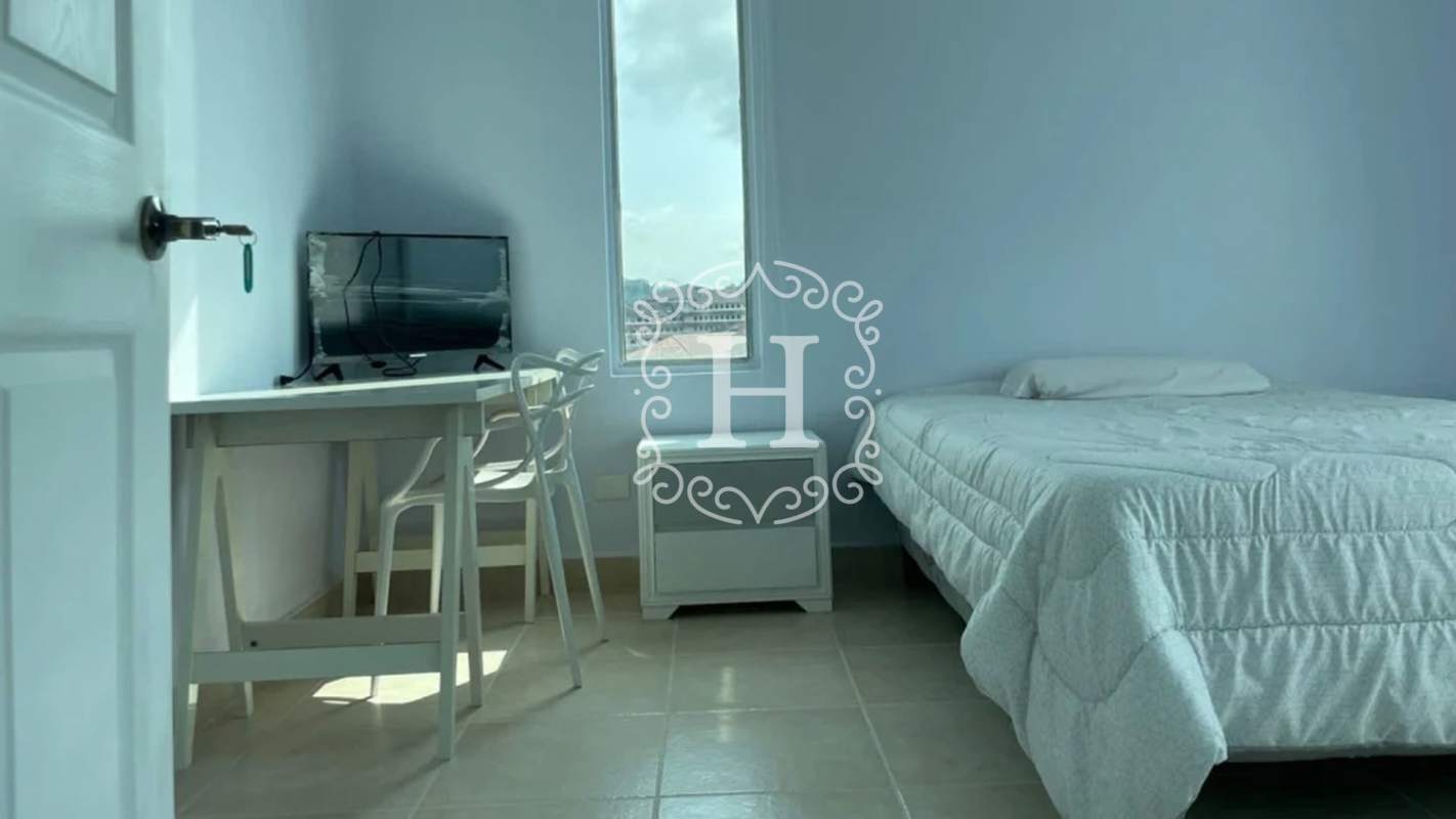 Modern minimalist bedroom with window bright natural light in PH Clayton Park I Panama City rental apartment